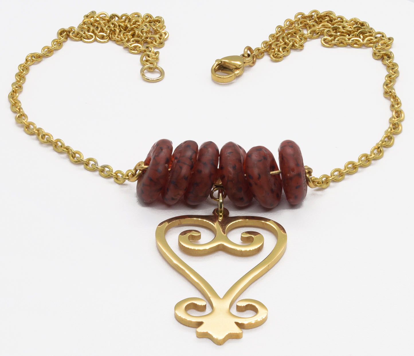 Handmade African Earrings & Sankofa Pendant With Amber-Colored Glass Beads - close-up
