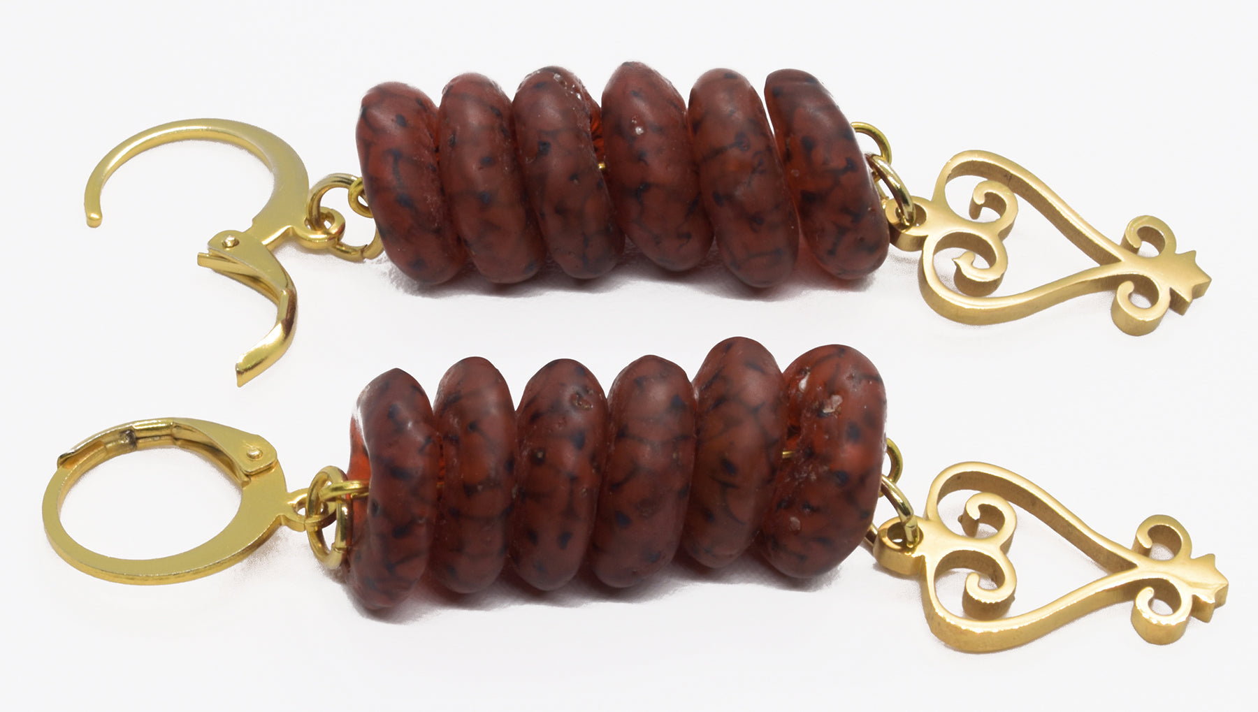 Handmade African Earrings & Sankofa Pendant With Amber-Colored Glass Beads - zoomed-in detail